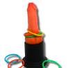 Trofeo con forma de pene y anillas de colores
