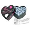 Juego Erotic Heart abierto con sus 21 retos enrollados