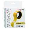 Boundless Bondage Tape amarilla junto a su caja