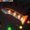 Pretty Love Magical Nightfall naranja brillando en la oscuridad