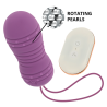 Huevo Ohmama con rotación lila, huevo con mando y detalle de las perlas giratorias