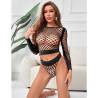 Conjunto Negro de Rejilla Top y Braguita Subblime, de frente en escena con plantas