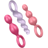 Los 3 plugs Satisfyer Booty Call de colores