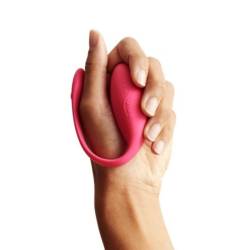 We-Vibe Jive rosa en la palma de una mano