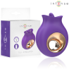 Estimulador Intense Tuli morado junto a su caja