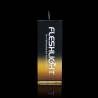 Fleshlight Stamina Training Unit con estuche dorado sobre fondo negro