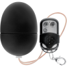 Vista frontal del huevo Online S negro junto al mando remoto