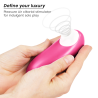 Womanizer Starlet 3 rosa en la mano con ondas Pleasure Air