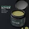 Tarro abierto de Fisting Butter de FistAssist con textura de mantequilla