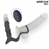 Anillo con plug prostático Up & Down Addicted Toys colocado sobre un dildo de muestra