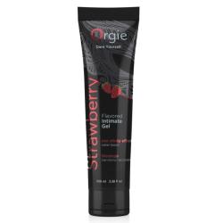 Vista frontal del tubo negro Orgie Lube Tube Strawberry de 100 ml con dibujo de fresas