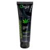 Vista frontal del tubo negro Orgie Lube Tube Cannabis de 100 ml con hoja verde dibujada