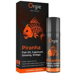 Envase y caja de Orgie Piranha con diseño negro y naranja