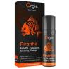 Envase y caja de Orgie Piranha con diseño negro y naranja