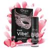 Caja y frasco Orgie Dual Vibe Strawberry Gin and Tonic rodeados de fresas ilustradas