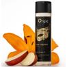 Orgie Sexy Therapy Amor 200 ml junto a una flor y fruta decorativas