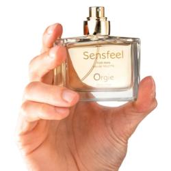 Frasco de Orgie Sensfeel para hombre 50 ml sostenido en la mano