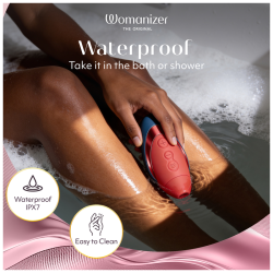 Womanizer Next Liberty azul y rojo en el baño