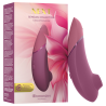 Womanizer Next rosa empolvado con su caja