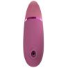 Womanizer Next rosa empolvado de frente