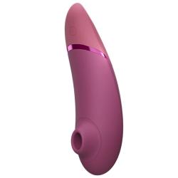 Womanizer Next rosa empolvado de lado