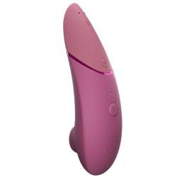 Womanizer Next rosa empolvado inclinado