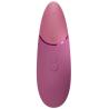 Womanizer Next rosa empolvado botones