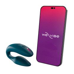 We-Vibe Sync 2 verde terciopelo junto a un móvil con la app We-Vibe